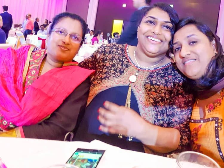 Reena with family members, showing her loving relationships and personal connections